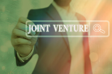 Word writing text Joint Venture. Business photo showcasing business partnership invested jointly by...