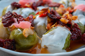 Brussels sprout salad with dried tomatoes and yogurt macro