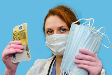 A woman medical doctor holds cash euros in her hands. A nurse girl with money in a protective mask on a blue background.