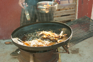 June 5, 2020, La paz, Mexico, preparing some tasty fish to the disk on a Sunday of rest.