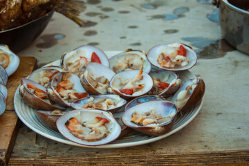 June 5, 2020, La Paz, Mexico, the most basic way to eat clams in Mexico alone in their shell with salt and lemon.