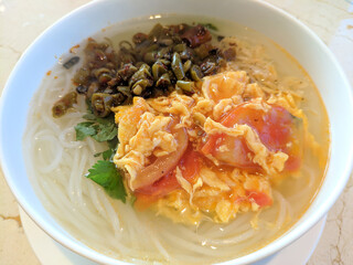 scrambled eggs and sour peas on  Chinese traditional rice noodles