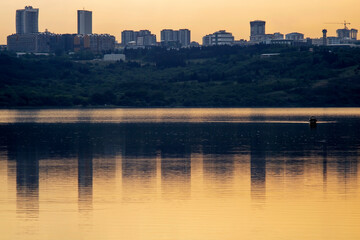 A city sunset view from the sea