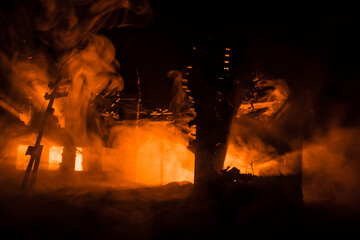 Apocalyptic view of city downtown as disaster film poster concept. Night scene. City destroyed by...