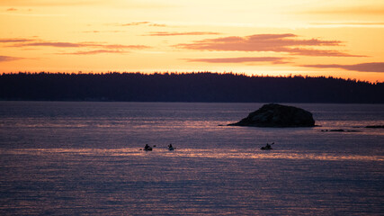 Kayaks on Samish Bay at dusk