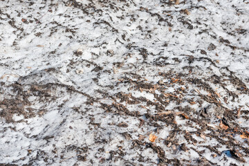 Spring is on the street. Dirty snow. Snow melts. Spring weather.