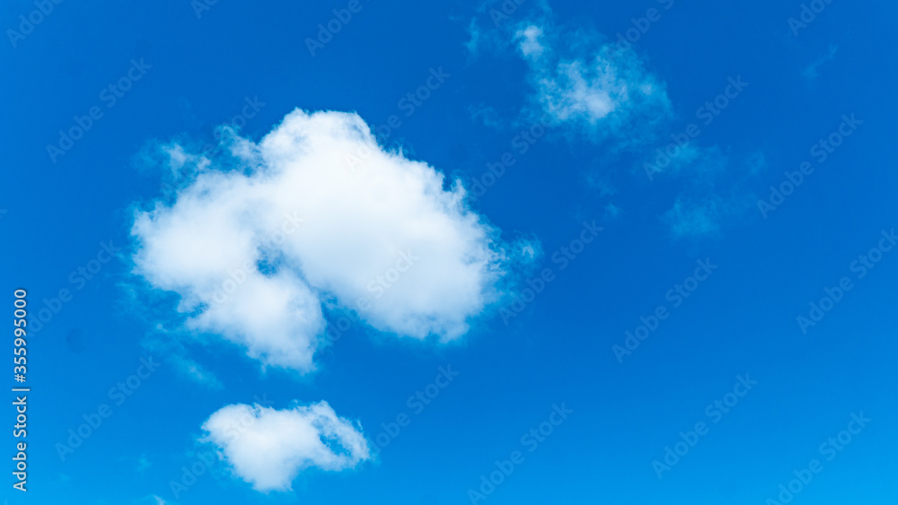 Wall mural blue sky with clouds