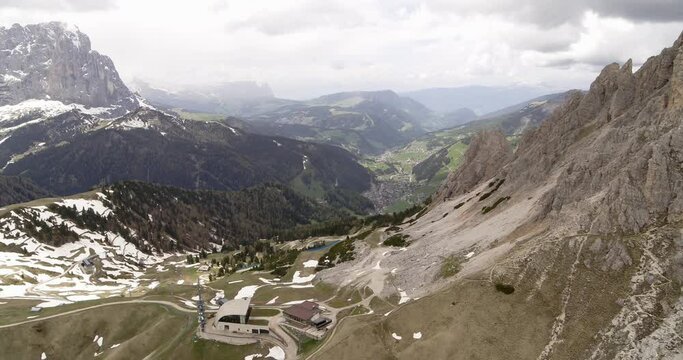 Aerial of Selva Val gardena seen from Passo Gardena. Cir Mountain on the right. Ethereal South Tyrol in Italy