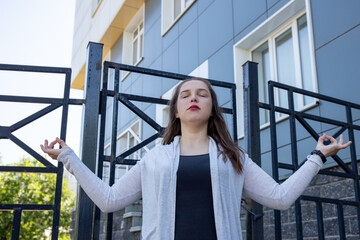 Calm woman relaxing meditation, stress free relief at work concept, conscious peaceful young...