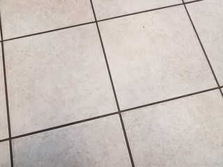 white square tiles on floor or ground or background