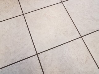 white square tiles on floor or ground or background