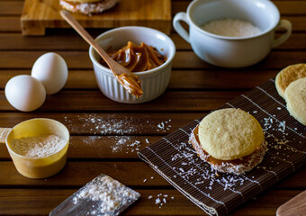 Argentine dulce de leche preparation composition with grated coconut, wheat flour, eggs