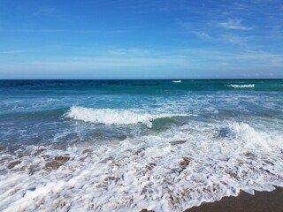 Fototapeta na wymiar ocean water with waves at beach or coast