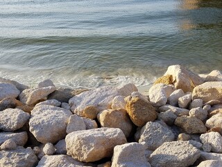 large white rocks on shore