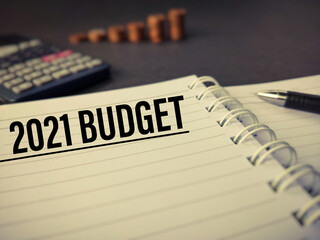 Finance, Business and Economy Concept - 2021 BUDGET text written on paper in vintage. Stock photo