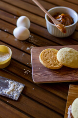 Uruguayan dulce de leche preparation composition with grated coconut, wheat flour, eggs