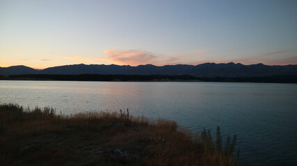 Naklejka premium Lake Pukaki in South Island, New Zealand sunset view