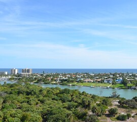 view of boats and river water from lighthouse in Florida
