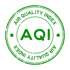 Grunge green AQI (Abbreviation of air quality index) word round rubber seal stamp on white background