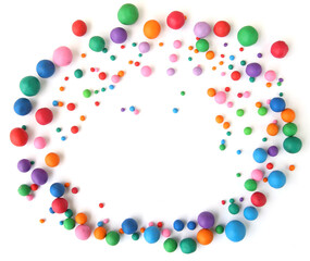 Frame of colorful plasticine balls isolated on white background. Abstract  many balls made of modeling clay,.