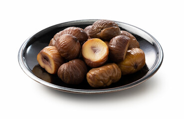 Peeled sweet chestnuts on a white background