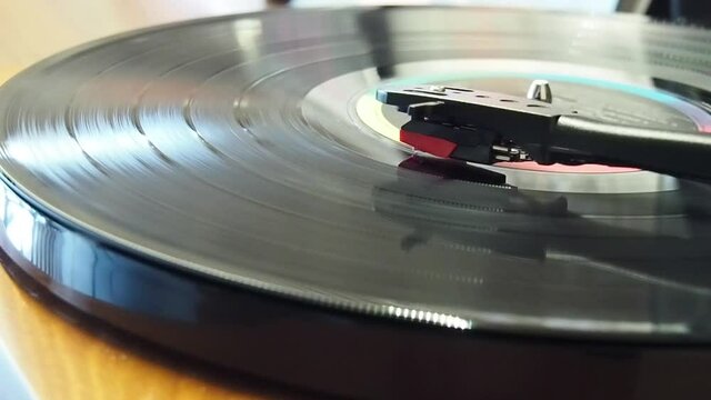 Close up playing modern turntable. Background video for music and retro stye.