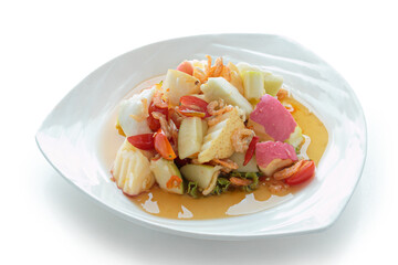 Fruits salad and vegetable in dish isolated on white background. With clipping path..