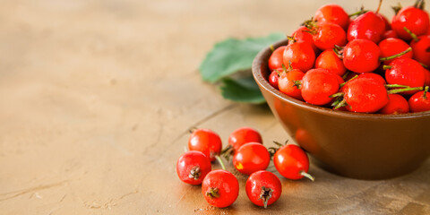 red berries of a hawthorn on a table, selective focus