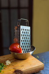Grated tomato in the kitchen