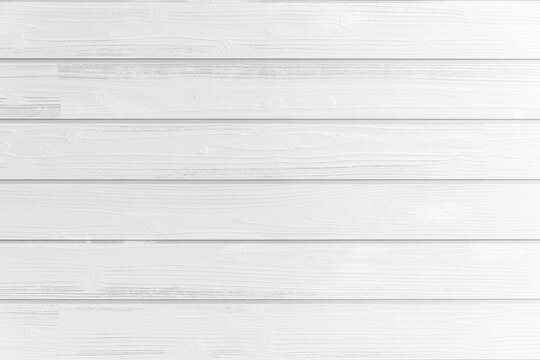 Empty white plank panel wood wall surface texture for background or decoration design.