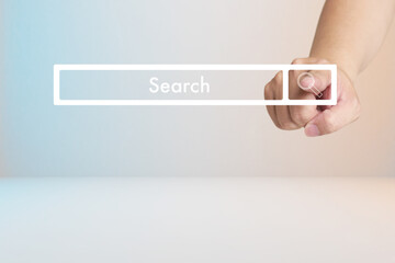 Hand touching the search button