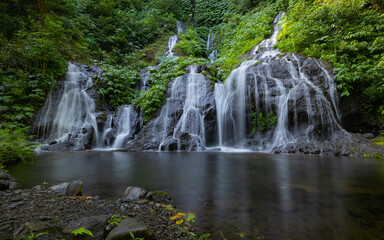 Waterfall landscape. Beautiful hidden waterfall in tropical rainforest. Nature background. Slow...