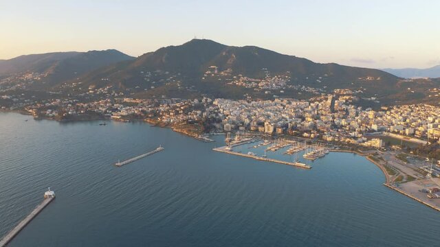 Majestic Scenery At Mytilene City In Lesvos Island, Greece With Boats And Yachts Moored On The Harbor In The Aegean Sea. - aerial drone shot