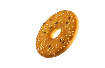 Round cookies with sesame seeds on a white background
