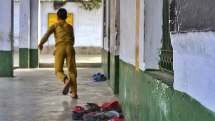 Student running from studies