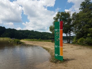 Fototapeta na wymiar sign in park indicating flood height levels