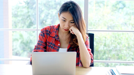 Stress asian woman struggle with laptop computer, Frustrated female at home office desk, People struggle with technology, Asia female overworked, exhausted and take a break while work from home