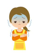 エプロンをした体調不良で悪寒がする主婦