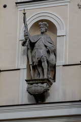 Sculpture of St. Mauritius on the facade of the Church of St. Mauritius at ul. Traugutta 34 in Wroclaw, in Poland - obrazy, fototapety, plakaty
