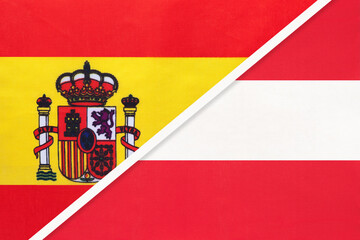 Obraz premium Spain and Austria, symbol of two national flags from textile. Championship between two european countries.
