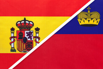 Obraz premium Spain and Liechtenstein, symbol of two national flags from textile. Championship between two european countries.