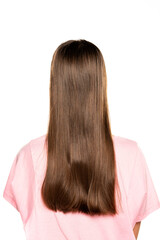 rear view of young woman with long hair