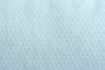 Texture of a universal household napkin for dry and wet cleaning. Napkin made of non-woven viscose and polyester.