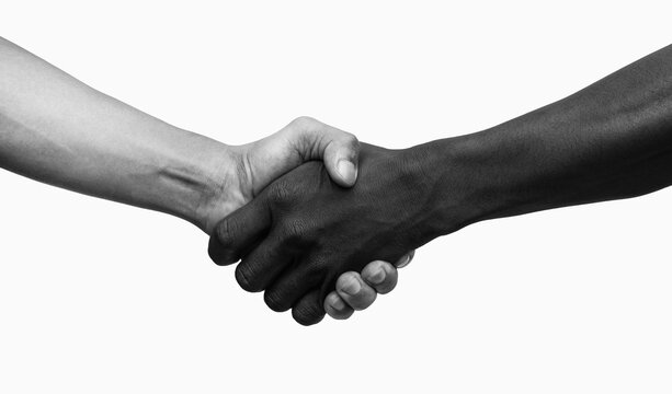 African–American and American shaking hands, Black and white image.