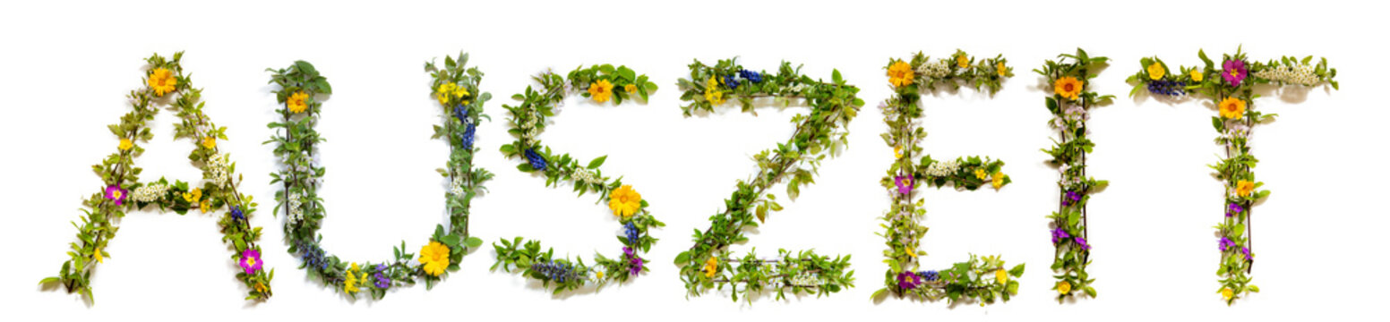 Flower, Branches And Blossom Letter Building German Word Auszeit Means Downtime. White Isolated Background