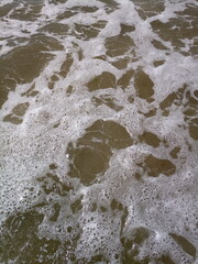 muddy sea water on a cloudy day