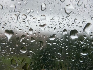 Closeup of raindrops on a window.