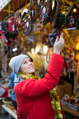 Girl shopping Christmas decorations