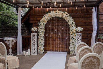 arch for a wedding ceremony of flowers in the park