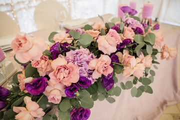 banquet table in a restaurant with flower decor